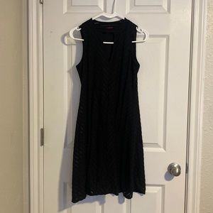 Black chevron dress with keyhole in front on chest.